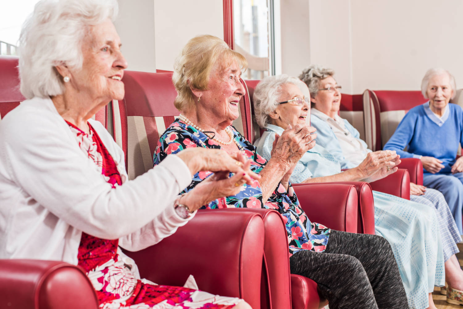 Residents enjoying entertainment in the lounge
